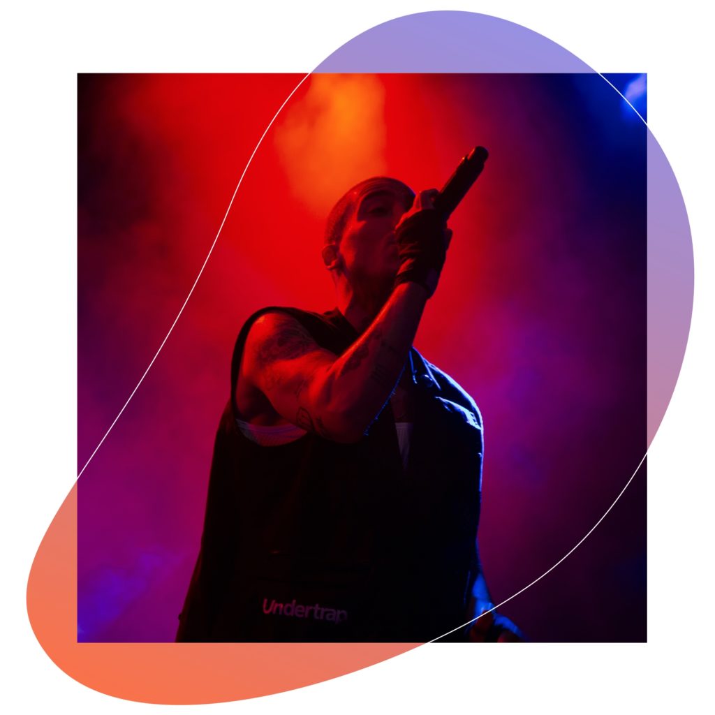 A man sings on stage.